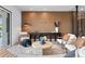 Living room with wood wall and stylish seating at 17059 Dolphin Dr, North Redington Beach, FL 33708