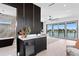 Spacious main bedroom with water views and ensuite bathroom at 17059 Dolphin Dr, North Redington Beach, FL 33708