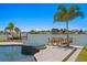Relaxing pool and spa with a private dock and picturesque waterfront views at 17059 Dolphin Dr, North Redington Beach, FL 33708