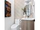 Modern powder room with geometric tile and stylish vanity at 17059 Dolphin Dr, North Redington Beach, FL 33708