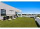 Spacious rooftop terrace with outdoor kitchen and water views at 17059 Dolphin Dr, North Redington Beach, FL 33708