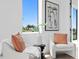 Relaxing sitting area with comfy armchairs and natural light at 17059 Dolphin Dr, North Redington Beach, FL 33708