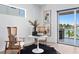 Cozy sitting area with water views and a unique chair at 17059 Dolphin Dr, North Redington Beach, FL 33708