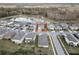 Aerial view of house and surrounding neighborhood at 18079 Ramble On Way, Land O Lakes, FL 34638