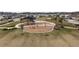 Aerial view of a neighborhood playground and homes at 18079 Ramble On Way, Land O Lakes, FL 34638