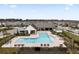 Aerial view of community pool and cabana at 18079 Ramble On Way, Land O Lakes, FL 34638