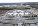 Aerial view of shopping center with parking lot at 18079 Ramble On Way, Land O Lakes, FL 34638