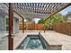 Relaxing backyard oasis with spa and pergola at 1824 Southwood Ln, Clearwater, FL 33764