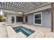 Spa and patio area with pergola at 1824 Southwood Ln, Clearwater, FL 33764