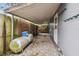 Covered patio area with propane tank at 1824 Southwood Ln, Clearwater, FL 33764