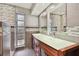 Double vanity bathroom with glass countertop at 1824 Southwood Ln, Clearwater, FL 33764