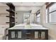 Bathroom with double vanity and light wood cabinets at 1824 Southwood Ln, Clearwater, FL 33764