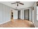 Bedroom with wood floors and built in shelves at 1824 Southwood Ln, Clearwater, FL 33764