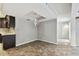 Dining area with tile floors and modern chandelier at 1824 Southwood Ln, Clearwater, FL 33764