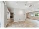 Bright dining area with tile floors and views to living room and kitchen at 1824 Southwood Ln, Clearwater, FL 33764