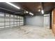 Two-car garage featuring ample space and built-in storage at 1824 Southwood Ln, Clearwater, FL 33764