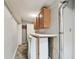 Functional laundry room with washer, dryer, and storage cabinets at 1824 Southwood Ln, Clearwater, FL 33764