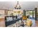 Spacious living area, open to kitchen and with access to the backyard and pool at 18437 Purple Creek Ln, Lutz, FL 33549