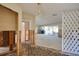 Renovation in progress, entryway with tiled floor and open doors at 2430 Roberta Ln, Clearwater, FL 33764