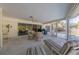 Spacious screened patio with seating area and pool access at 2430 Roberta Ln, Clearwater, FL 33764