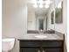 Bathroom with granite vanity and large mirror at 28523 Pleasant Bay Loop, Wesley Chapel, FL 33543