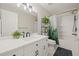 Clean bathroom with a white vanity, shower, and bathtub at 31445 Amberlea Rd, Dade City, FL 33523