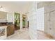 Spa-like bathroom with a large walk-in shower and glass block wall at 31445 Amberlea Rd, Dade City, FL 33523