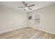 Bright bedroom with neutral walls and wood-look flooring at 31445 Amberlea Rd, Dade City, FL 33523