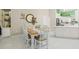 Charming dining room featuring a farmhouse table and white chairs at 31445 Amberlea Rd, Dade City, FL 33523