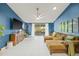 Relaxing living room with sectional sofa and blue walls at 31445 Amberlea Rd, Dade City, FL 33523
