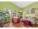 Relaxing living room with arched windows and a dining area at 31445 Amberlea Rd, Dade City, FL 33523
