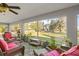Relaxing screened porch overlooking a tranquil backyard at 31445 Amberlea Rd, Dade City, FL 33523
