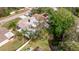 Aerial view showing the property's canal-front location and backyard oasis at 3282 Honeysuckle Rd, Largo, FL 33770