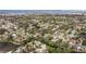 Aerial view of the home, highlighting its location in a tranquil waterfront community at 3282 Honeysuckle Rd, Largo, FL 33770