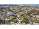 Aerial view of the property, showing its position in a residential area near a canal at 3282 Honeysuckle Rd, Largo, FL 33770