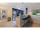 Kitchen with breakfast bar, stainless steel appliances, and an open layout at 3282 Honeysuckle Rd, Largo, FL 33770