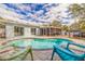 Inviting kidney-shaped pool with lounge chairs and a spacious deck at 3282 Honeysuckle Rd, Largo, FL 33770