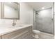 Updated bathroom features a walk-in shower and modern vanity at 3721 9Th S Ave, St Petersburg, FL 33711