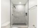 Modern bathroom with a large marble-tiled shower and updated fixtures at 3721 9Th S Ave, St Petersburg, FL 33711