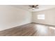 Bright bedroom with wood-look flooring and a ceiling fan at 3721 9Th S Ave, St Petersburg, FL 33711