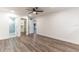 Bright bedroom with wood-look flooring and access to bathroom and closet at 3721 9Th S Ave, St Petersburg, FL 33711