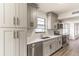 Modern kitchen featuring gray cabinets, quartz countertops, and stainless steel appliances at 3721 9Th S Ave, St Petersburg, FL 33711