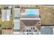 Community pool, shuffleboard courts, and clubhouse at 37538 New Horizons Blvd, Zephyrhills, FL 33541