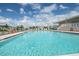 Inviting community pool with lounge chairs at 37538 New Horizons Blvd, Zephyrhills, FL 33541