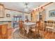 Charming dining area with wood table and built-in hutch at 37538 New Horizons Blvd, Zephyrhills, FL 33541