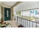 Covered front porch with access ramp and a view of the front yard at 37538 New Horizons Blvd, Zephyrhills, FL 33541