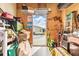 Storage room with shelving, and access to backyard at 37538 New Horizons Blvd, Zephyrhills, FL 33541