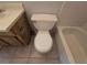 Toilet and bathtub in a clean bathroom at 4031 Tumble Wood Trl # 203, Tampa, FL 33613