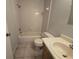Clean bathroom with a bathtub, toilet, and vanity at 4031 Tumble Wood Trl # 203, Tampa, FL 33613