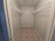 Large walk-in closet with wire shelving at 4031 Tumble Wood Trl # 203, Tampa, FL 33613